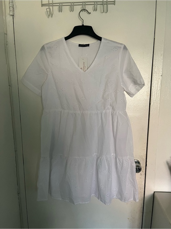 barn swallow Dresses & Skirts - Tiered Eyelet V-Neck Tunic Dress in White